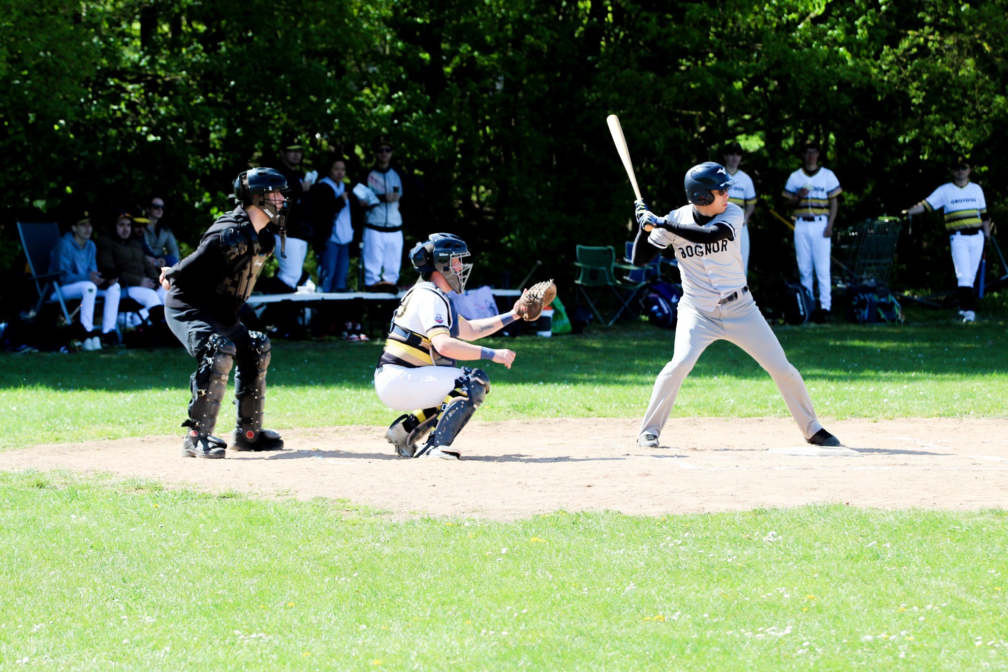 Baseball player preparing to bat during a match